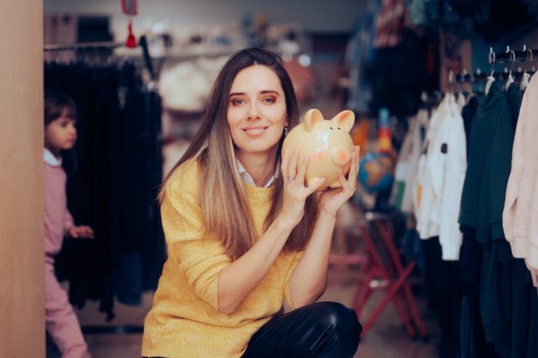 mother buying in a children fashion store during sale season.